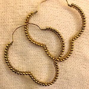 Gold plated beaded hoops.